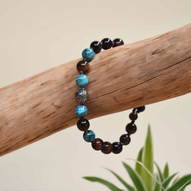 Bracelet homme avec une boule croix en acier et des pierres en chrysocolle et oeil de taureau