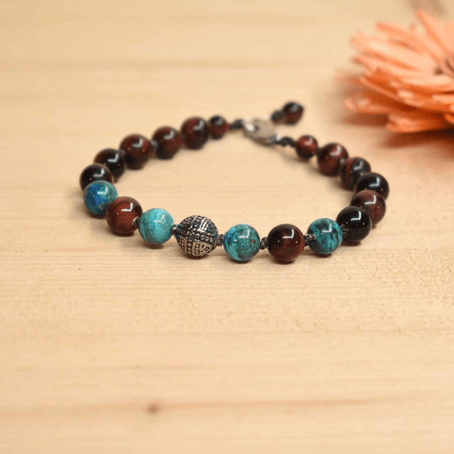Bracelet homme avec une boule croix en acier et des pierres en chrysocolle et oeil de taureau