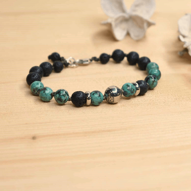 Bracelet homme boule aztèque en acier avec des pierres de 8mm en pierre de lave et turquoise africaine